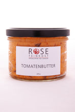 Lade das Bild in den Galerie-Viewer, Wir verwenden für unsere Buttersorten ausschließlich mildgesäuerte Butter, beste Kräuter, Gewürze und andere natürliche Zutaten. Die sonnengetrockneten, italienischen Tomaten sorgen für den einzigartig fruchtigen Geschmack und die orange-rote Färbung. Unsere Tomatenbutter kann als Brotaufstrich, zu Käse oder zu Roastbeef verkostet werden, passt aber auch sehr gut in einen Grillabend.